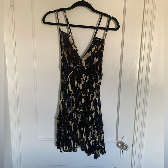 Free people dress with double satraps and side cut outs. - Picture 1 of 3